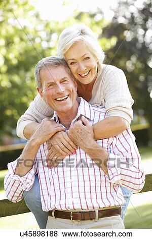 Senior couple outdoors View Large Photo Image Stock Photo - Senior couple outdoors. Fotosearch