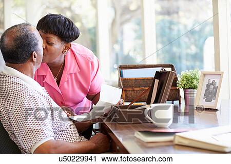 Senior Couple Putting Letter Into Keepsake Box View Large Photo Image Stock Image - Senior Couple Putting Letter Into Keepsake Box. Fotosearch