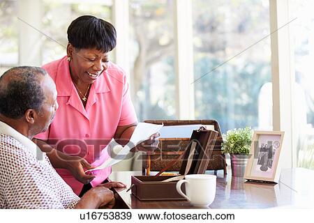 Senior Couple Putting Letter Into Keepsake Box View Large Photo Image Stock Photo - Senior Couple Putting Letter Into Keepsake Box. Fotosearch