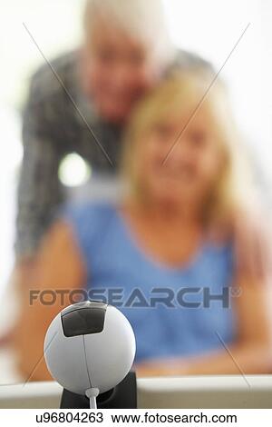 Senior couple using skype View Large Photo Image Stock Image - Senior couple using skype. Fotosearch