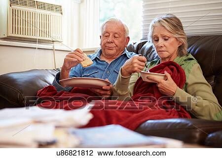 Senior Couple With Poor Diet Keeping Warm Under Blanket View Large Photo Image Stock Image - Senior Couple With Poor Diet Keeping Warm Under Blanket . Fotosearch