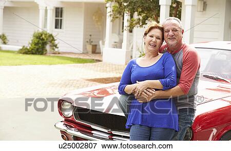 Senior Couple With Restored Classic Car View Large Photo Image Stock Photo - Senior Couple With Restored Classic Car. Fotosearch