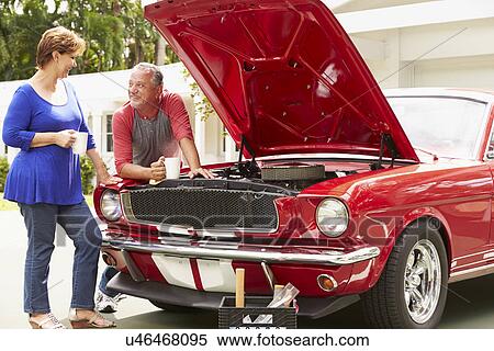 Senior Couple With Restored Classic Car View Large Photo Image Stock Photography - Senior Couple With Restored Classic Car. Fotosearch
