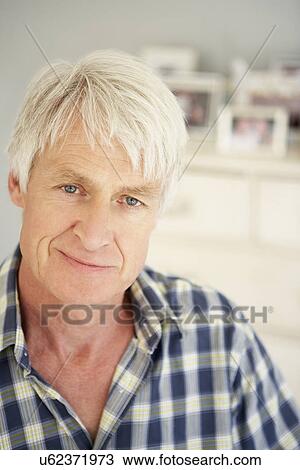 Stock Image - Senior man at home. Fotosearch