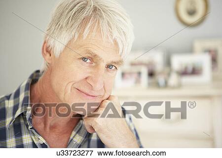 Senior man at home View Large Photo Image Stock Photo - Senior man at home. Fotosearch