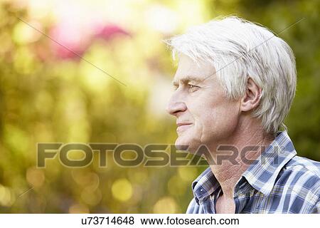 Senior man in garden View Large Photo Image Stock Photo - Senior man in garden. Fotosearch