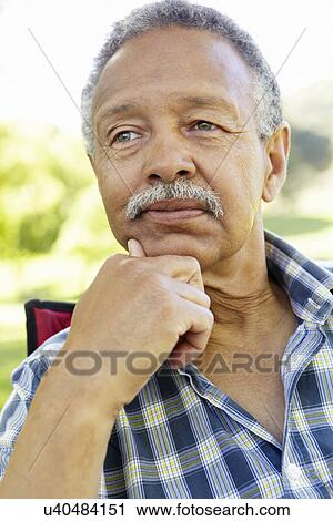 Senior man portrait outdoors View Large Photo Image Stock Image - Senior man portrait outdoors. Fotosearch