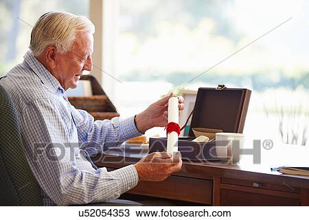 Senior Man Putting Will Into Box View Large Photo Image Stock Image - Senior Man Putting Will Into Box. Fotosearch