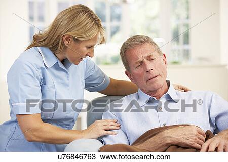 Senior man visited at home by nurse View Large Photo Image Stock Image - Senior man visited at home by nurse. Fotosearch