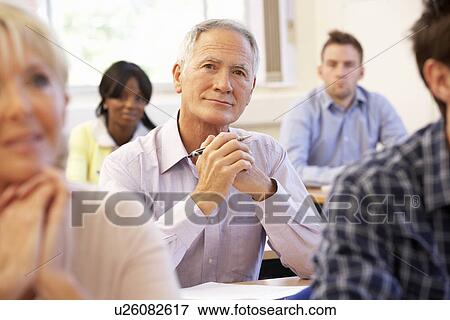 Senior student in class View Large Photo Image Stock Photo - Senior student in class. Fotosearch