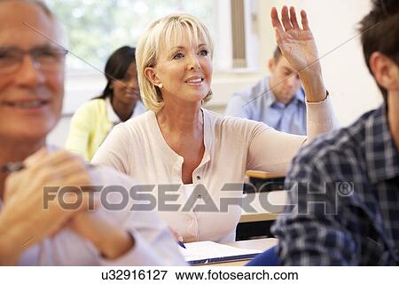 Senior student in class View Large Photo Image Stock Photo - Senior student in class. Fotosearch