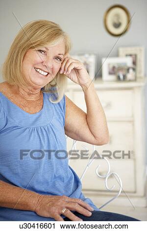 Stock Image - Senior woman at home. Fotosearch