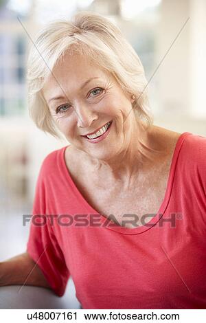 Senior woman at home View Large Photo Image Stock Image - Senior woman at home. Fotosearch
