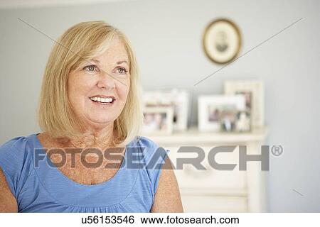 Stock Photograph - Senior woman at home. Fotosearch