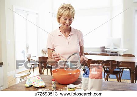 Senior Woman Baking In Kitchen View Large Photo Image Stock Image - Senior Woman Baking In Kitchen. Fotosearch