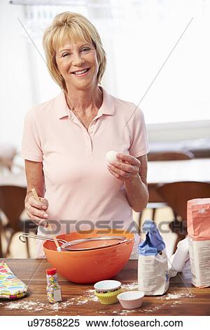 Senior Woman Baking In Kitchen View Large Photo Image Stock Photography - Senior Woman Baking In Kitchen. Fotosearch