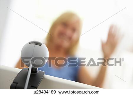 Stock Photo - Senior woman using skype. Fotosearch