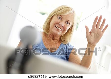 Senior woman using skype View Large Photo Image Stock Photo - Senior woman using skype. Fotosearch