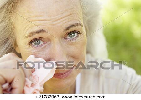 Senior woman with hay fever View Large Photo Image Stock Image - Senior woman with hay fever. Fotosearch