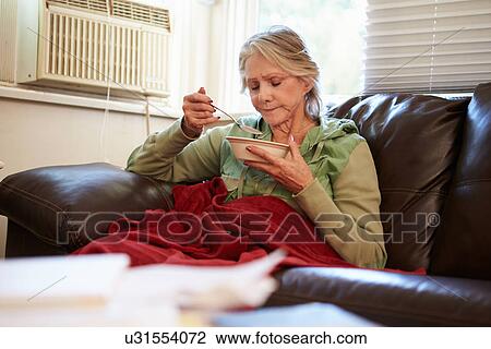 Senior Woman With Poor Diet Keeping Warm Under Blanket View Large Photo Image Stock Image - Senior Woman With Poor Diet Keeping Warm Under Blanket . Fotosearch