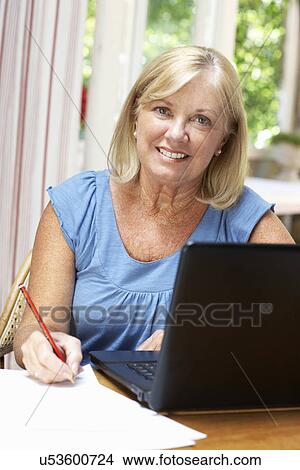 Senior Woman Working In Home Office View Large Photo Image Picture - Senior Woman Working In Home Office. Fotosearch