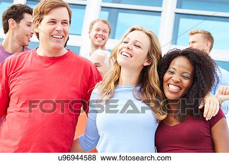 Stock Photo - Spectators Celebrating At Outdoor Sports Event. Fotosearch