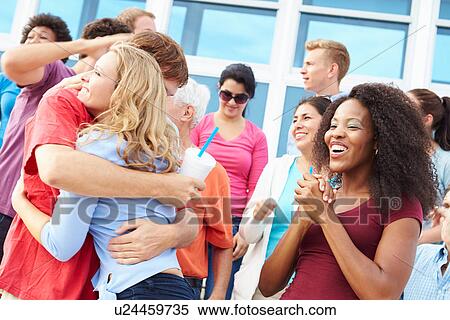 Spectators Celebrating At Outdoor Sports Event View Large Photo Image Stock Photography - Spectators Celebrating At Outdoor Sports Event. Fotosearch