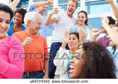Spectators Cheering At Outdoor Sports Event View Large Photo Image Stock Image - Spectators Cheering At Outdoor Sports Event. Fotosearch