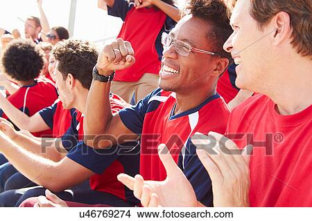 Spectators In Team Colors Watching Sports Event View Large Photo Image Picture - Spectators In Team Colors Watching Sports Event. Fotosearch