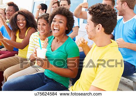 Spectators In Team Colors Watching Sports Event View Large Photo Image Picture - Spectators In Team Colors Watching Sports Event. Fotosearch