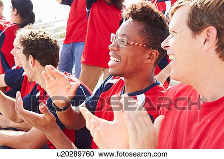 Spectators In Team Colors Watching Sports Event View Large Photo Image Stock Image - Spectators In Team Colors Watching Sports Event. Fotosearch