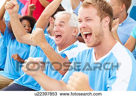Stock Image - Spectators In Team Colors Watching Sports Event. Fotosearch