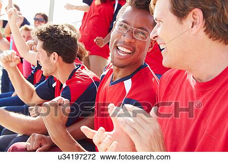 Spectators In Team Colors Watching Sports Event View Large Photo Image Stock Image - Spectators In Team Colors Watching Sports Event. Fotosearch