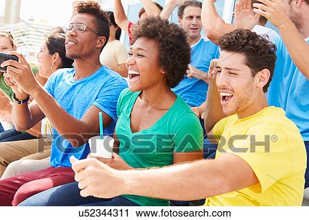 Spectators In Team Colors Watching Sports Event View Large Photo Image Stock Image - Spectators In Team Colors Watching Sports Event. Fotosearch