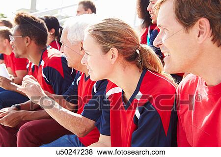 Spectators In Team Colors Watching Sports Event View Large Photo Image Stock Photo - Spectators In Team Colors Watching Sports Event. Fotosearch