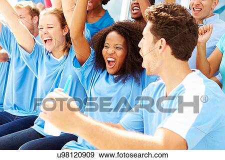Spectators In Team Colors Watching Sports Event View Large Photo Image Stock Photo - Spectators In Team Colors Watching Sports Event. Fotosearch