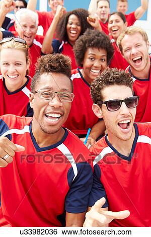 Spectators In Team Colors Watching Sports Event View Large Photo Image Stock Photograph - Spectators In Team Colors Watching Sports Event. Fotosearch