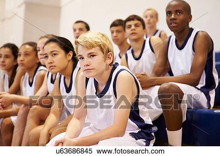 Stock Photography - Spectators Watching High School Basketball Team Match. Fotosearch