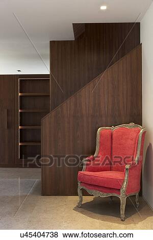 Stock Photo - Staircase Inside Modern House With Armchair. Fotosearch