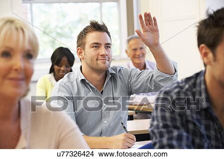 Picture - Student in class. Fotosearch