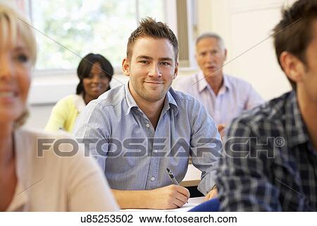 Student in class View Large Photo Image Stock Image - Student in class. Fotosearch