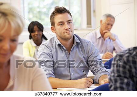 Student in class View Large Photo Image Stock Photo - Student in class. Fotosearch