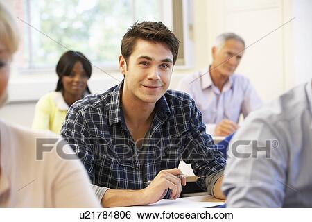 Student in class View Large Photo Image Stock Photograph - Student in class. Fotosearch
