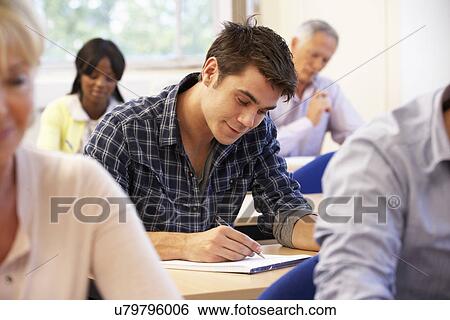 Student in class View Large Photo Image Stock Photograph - Student in class. Fotosearch