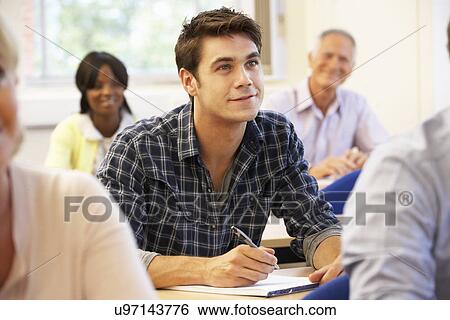 Stock Photograph - Student in class. Fotosearch