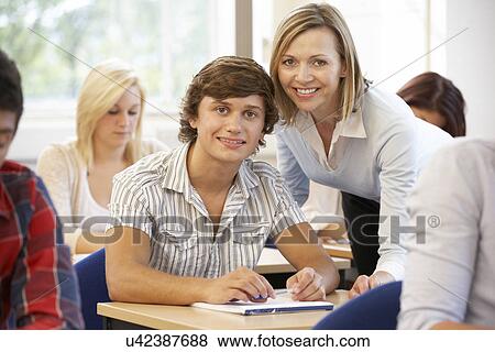 Students and tutor in class View Large Photo Image Stock Photo - Students and tutor in class. Fotosearch