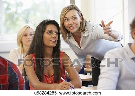 Students and tutor in class View Large Photo Image Stock Photography - Students and tutor in class. Fotosearch