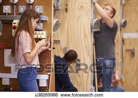 Students Training To Be Electricians In Workshop View Large Photo Image Stock Photograph - Students Training To Be Electricians In Workshop. Fotosearch