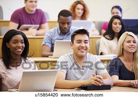 Students Using Laptops And Digital Tablets In Lecture View Large Photo Image Stock Image - Students Using Laptops And Digital Tablets In Lecture. Fotosearch
