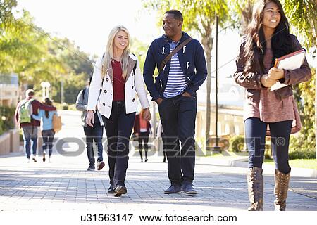 Students Walking Outdoors On University Campus View Large Photo Image Stock Photo - Students Walking Outdoors On University Campus. Fotosearch